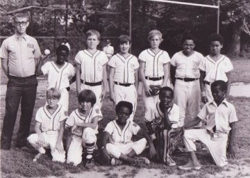 We played Little League in Harlan County.  Your author is on the front row, far left end.